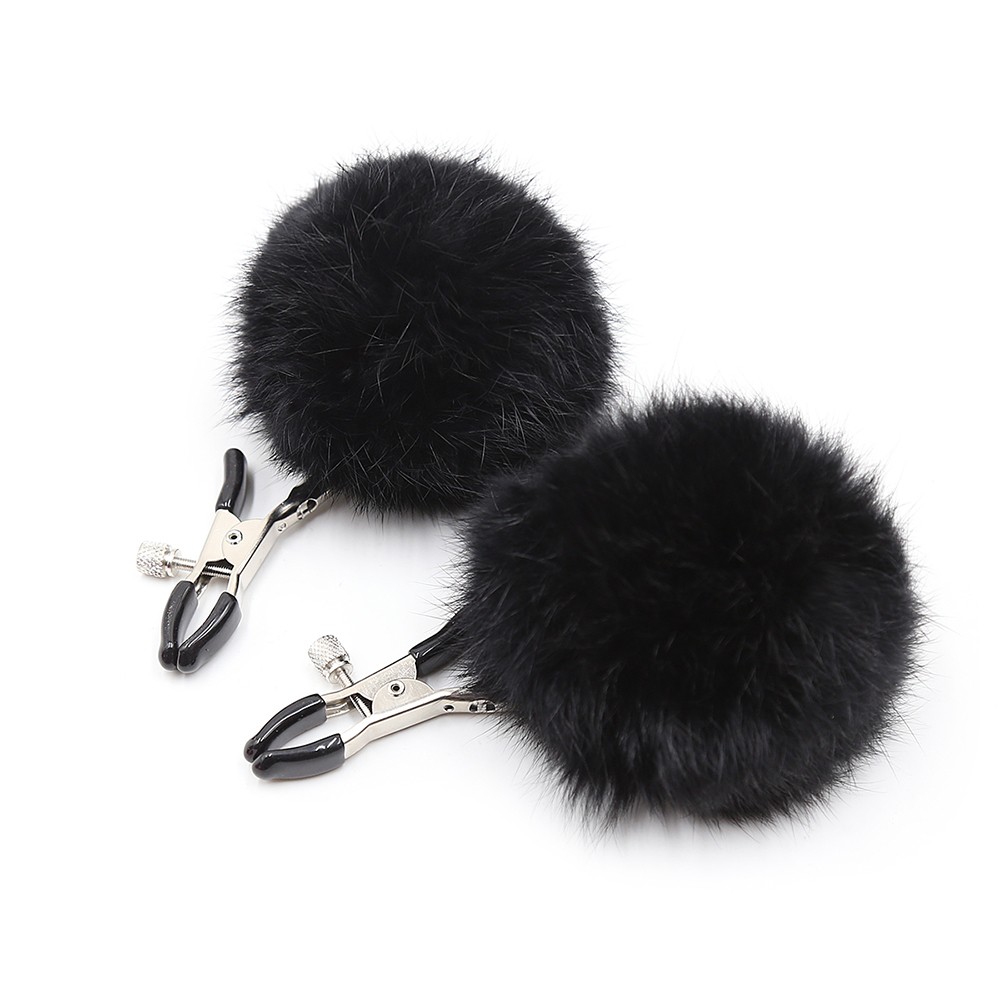 Breast pliers with black pompoms